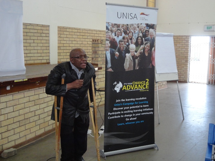 Community member addressing the workshop participants